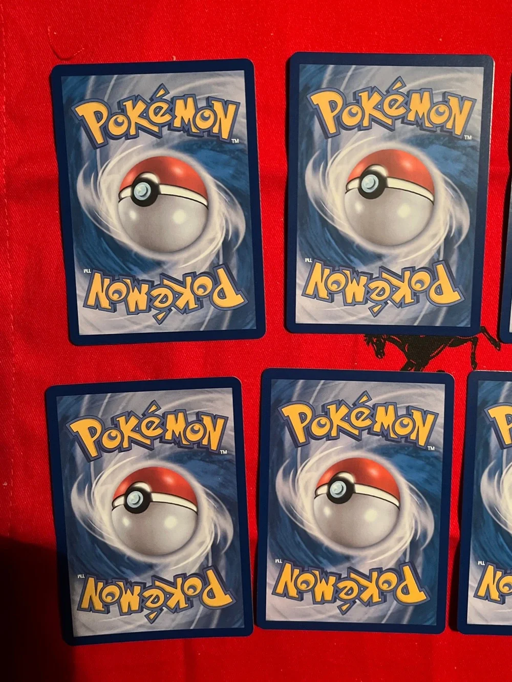 Pokemon Trading Card Lot with Red, Orange, Green, Black and Gold Holo Cards